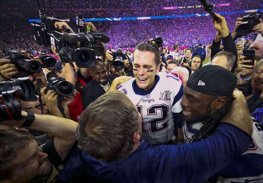 3. Tom Brady celebrates with coach Bill Belichick and teammate LeGarrette Blount after the New England Patriots' unprecedented overtime comeback victory against the Atlanta Falcons in Super Bowl LI, at NRG Stadium in Houston, Feb. 5, 2017. He was not the Brady everyone knew in the first half, spraying passes and missing receivers, and a large swath of America was reveling in it. Then, in the second half, fans saw the very thing they hope to see whenever they tune in to sports.  Photo: DOUG MILLS, NYT