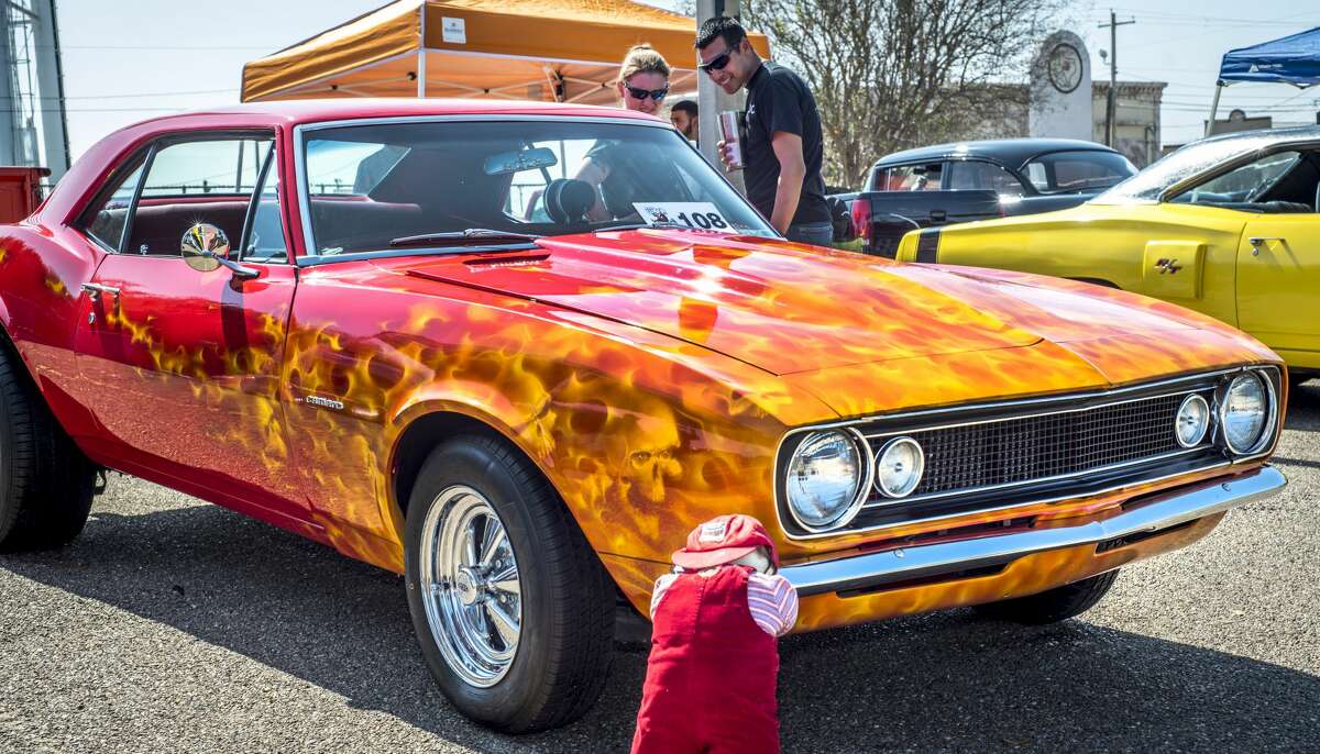 Custom car enthusiasts admired cars displayed by local and out of town car clubs on Saturday, February 11, 2017 during the WBCA Pipes and Stripes Car Show.
