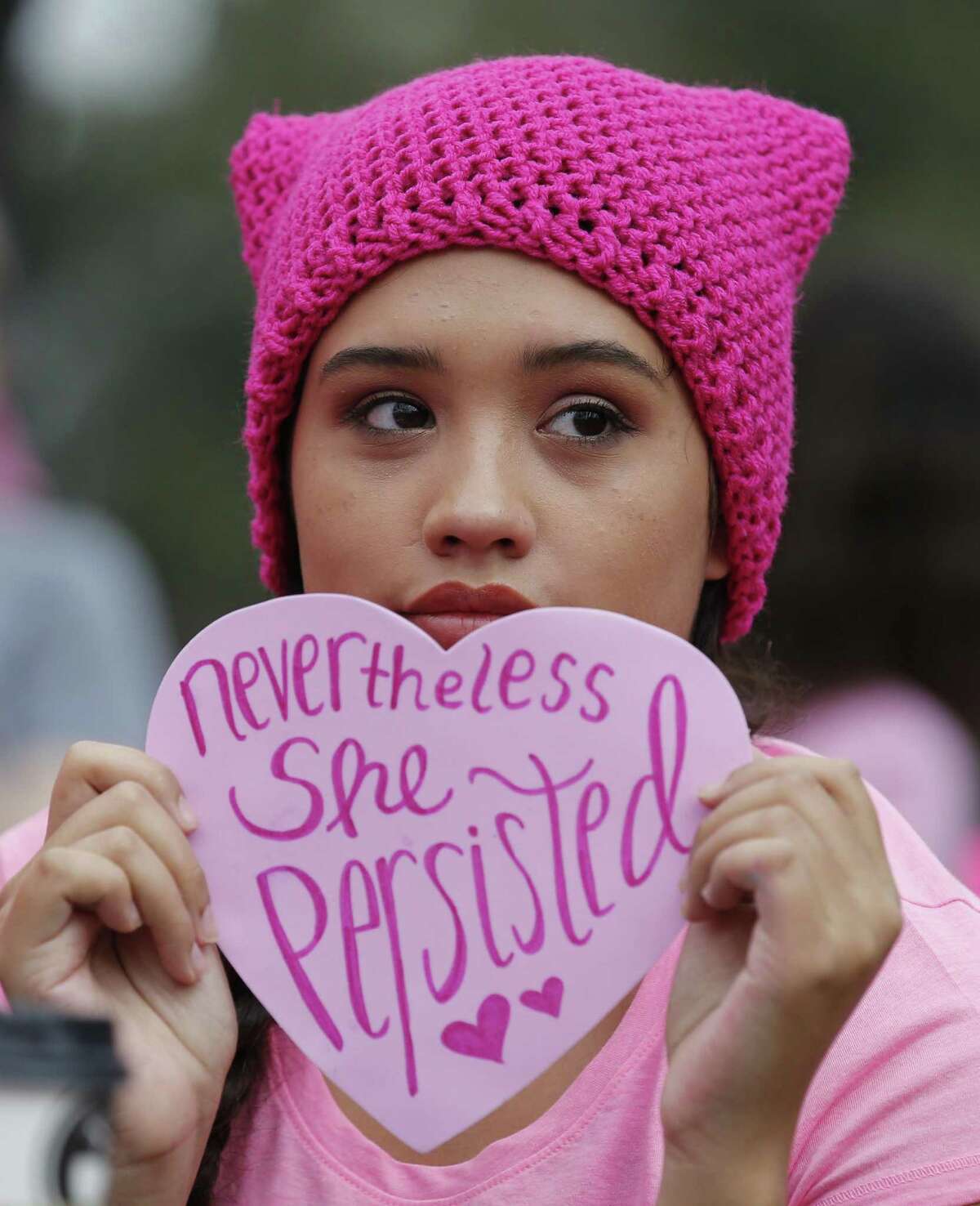 Lexi Romero wears the type of hat often seen during the Wo- men’s March on Washington.