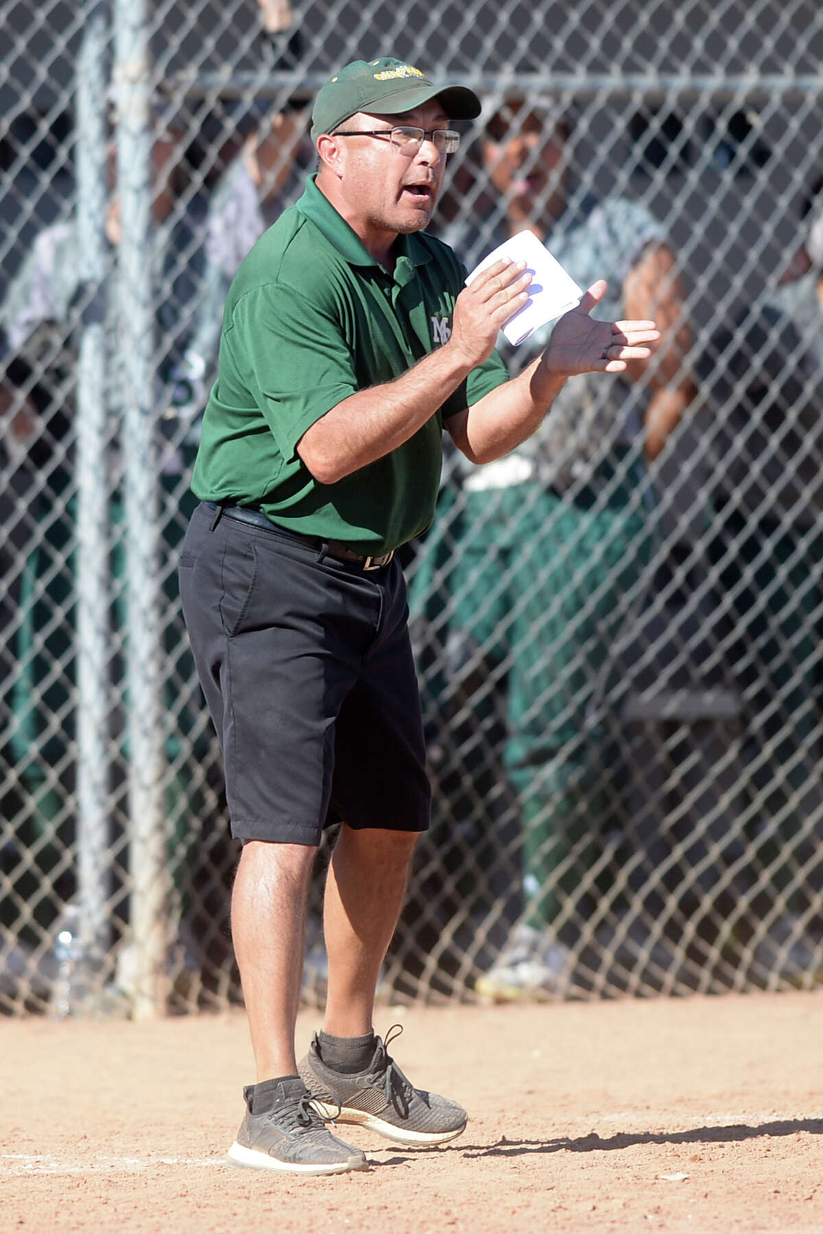Midland College softball head coach Tommy Ramos looks on during the game against Lamar College on Saturday, Feb. 11, 2017, at Chaparral Center. James Durbin/Reporter-Telegram