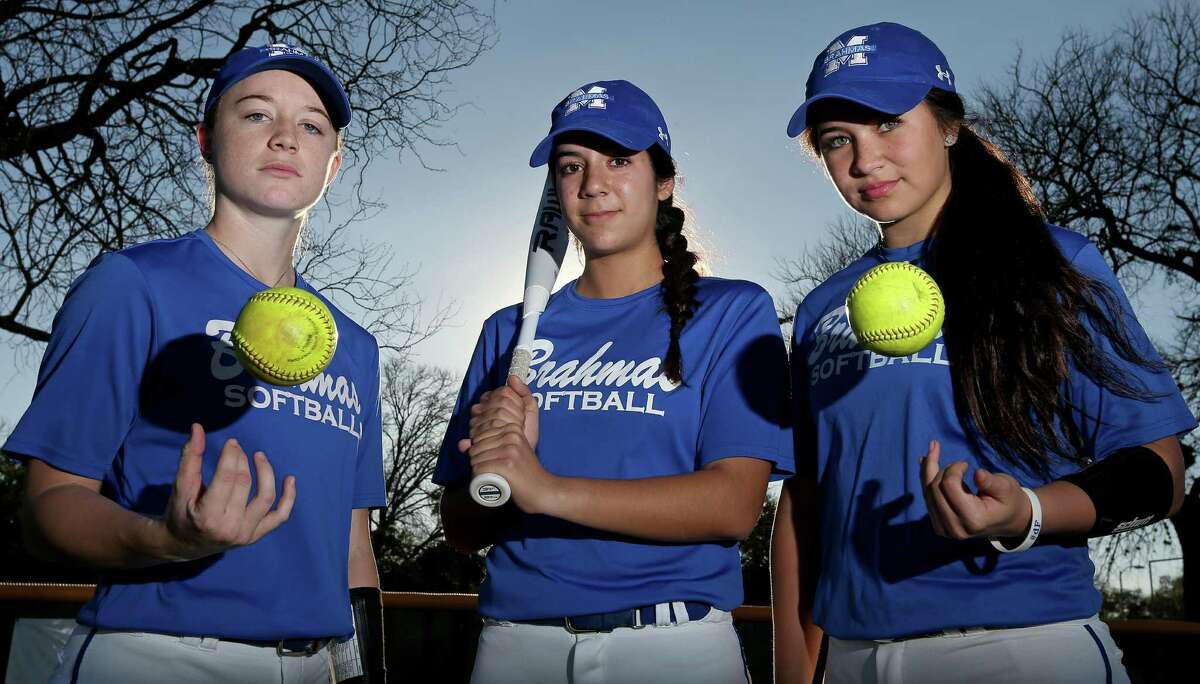 Portrait of MacArthur softball players Kindell Brooks (from left), Kiersten Licea and Taylor Medina on Feb. 9, 2017 at the school.