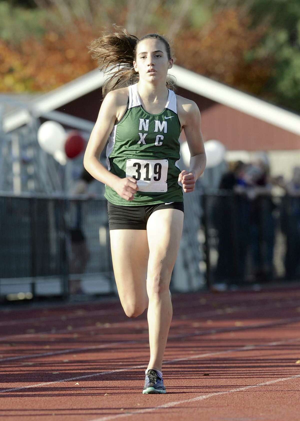 Mia Nahom (319), New Milford High School, finished 2nd in the girls SWC Cross Country Championship, held at Bethel High School, Bethel, Conn, on Friday, October 17, 2014.