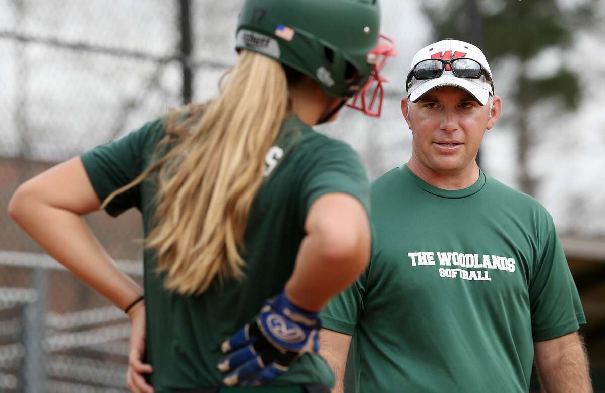 The Woodlands High School softball coach Tim Borths instruct a player during practice Friday, Feb. 10, 2017, in The Woodlands. ( Yi-Chin Lee / Houston Chronicle )