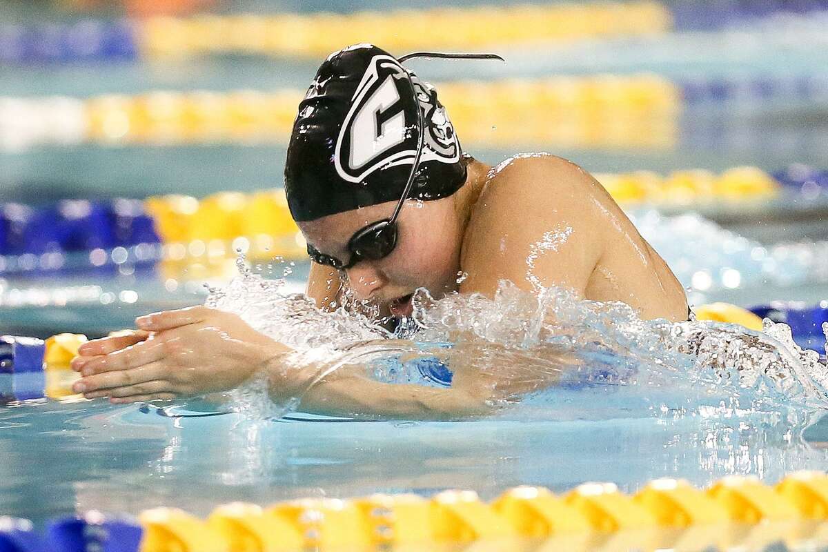 Clark's Elle Spitz swims in the girls 100-yard breaststroke during the Region VII-6A swimming championships at Josh Davis Natatorium on Saturday, Feb. 4, 2017. Spitz won the event with a time of 1:06.13. MARVIN PFEIFFER/ mpfeiffer@express-news.net