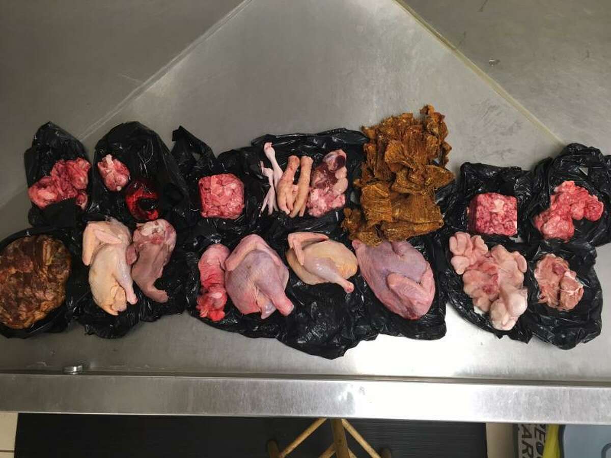 CBP agents seized 22 pounds of prohibited meat products, including raw cow meat, brains, hearts and tongues. >>Click to see odd items seized by TSA agents.