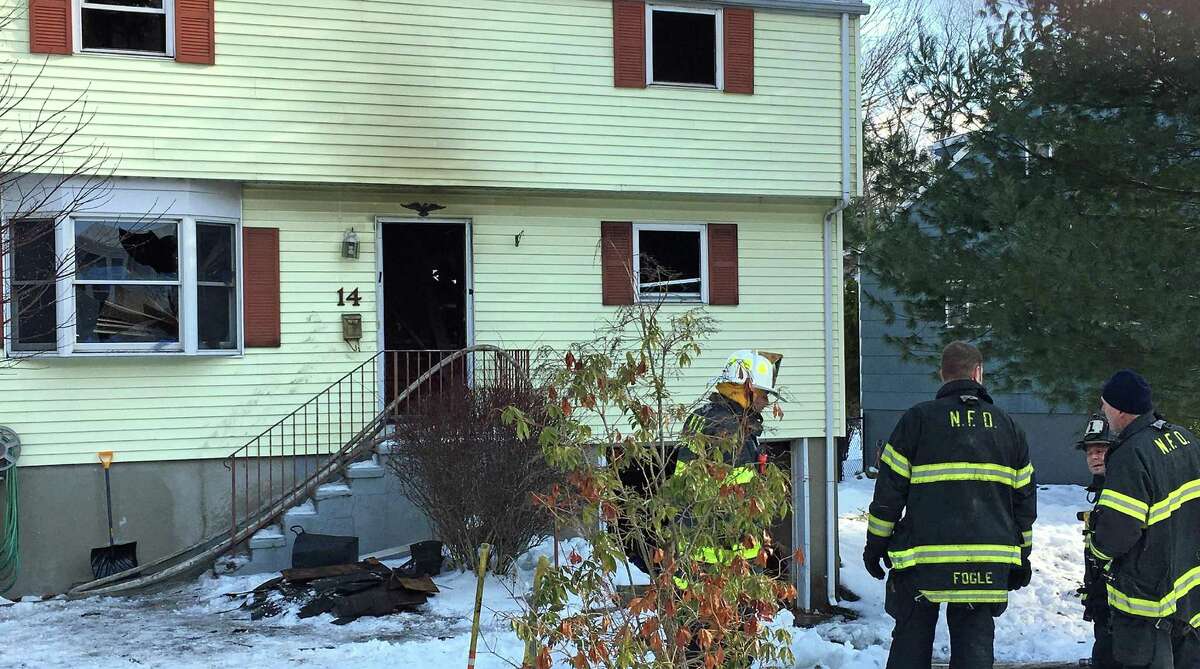 Norwalk firefighters battle house fire