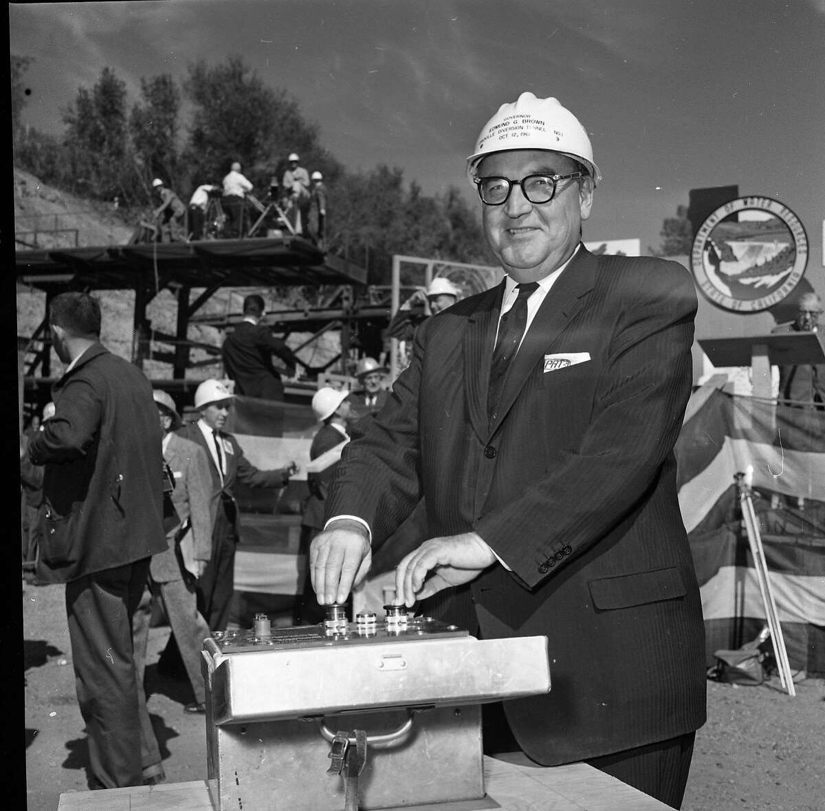 Then Governor Edmund G. Brown kicks off the building of the Oroville Dam, by trigger the initial blast for construction of the tunnel that will divert the water. 06/03/1961