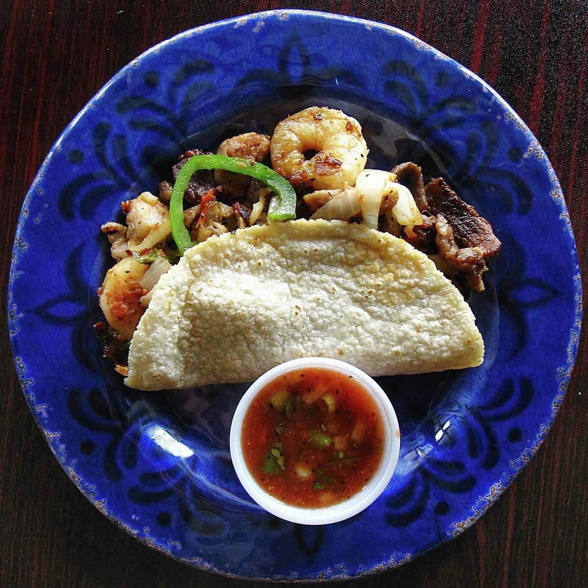 Tacof of the Week: "A La Casa" taco with grilled shrimp, chicken and beef on a handmade corn tortilla from Don Jose Mexican Cafe.