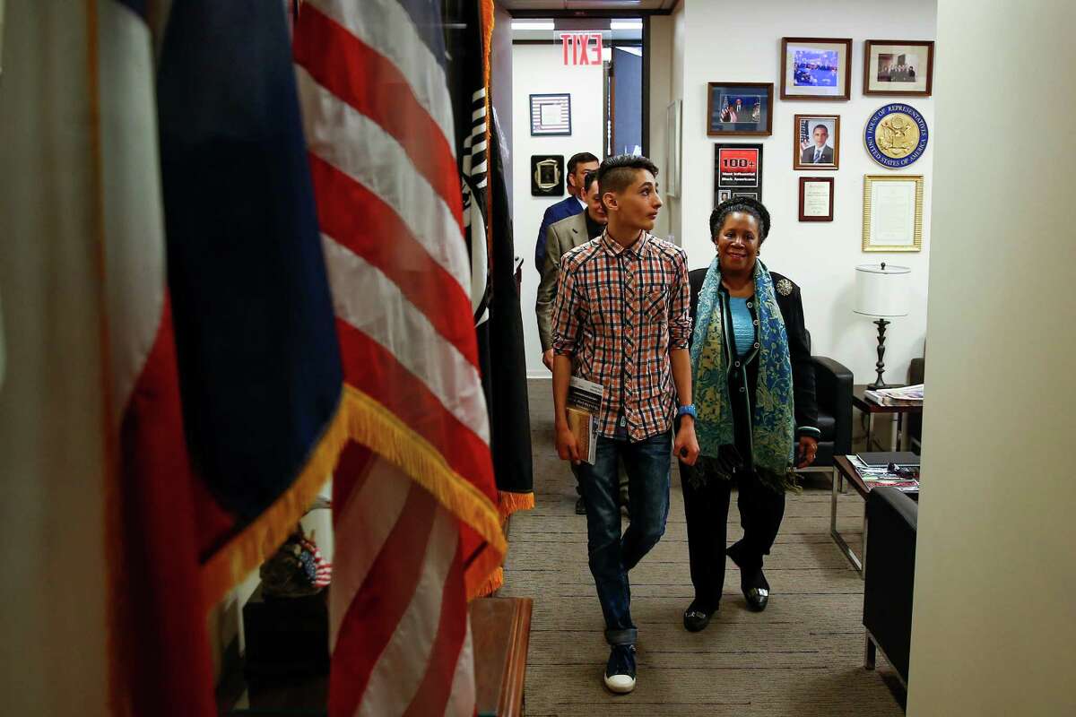 Mohammad Abu Khadra, 16, left, who lives in Katy with his brother, Rami Abu Khadra, walks with US Representative Sheila Jackson Lee out of her office Monday, Feb. 13, 2017 in Houston. With Lee's help, Khadra is back in the US after being detained for 10 days upon arrival from Jordan due to Donald Trump's immigration orders. Click through the slideshow to see protests to President Donald Trump's travel ban.