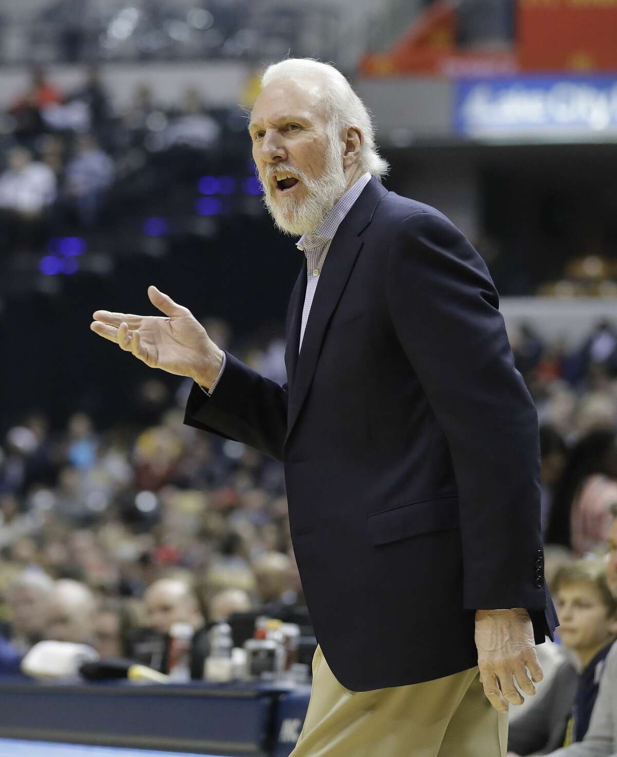 San Antonio Spurs head coach Gregg Popovich questions a call during the first half of an NBA basketball game against the Indiana Pacers, Monday, Feb. 13, 2017, in Indianapolis. (AP Photo/Darron Cummings)