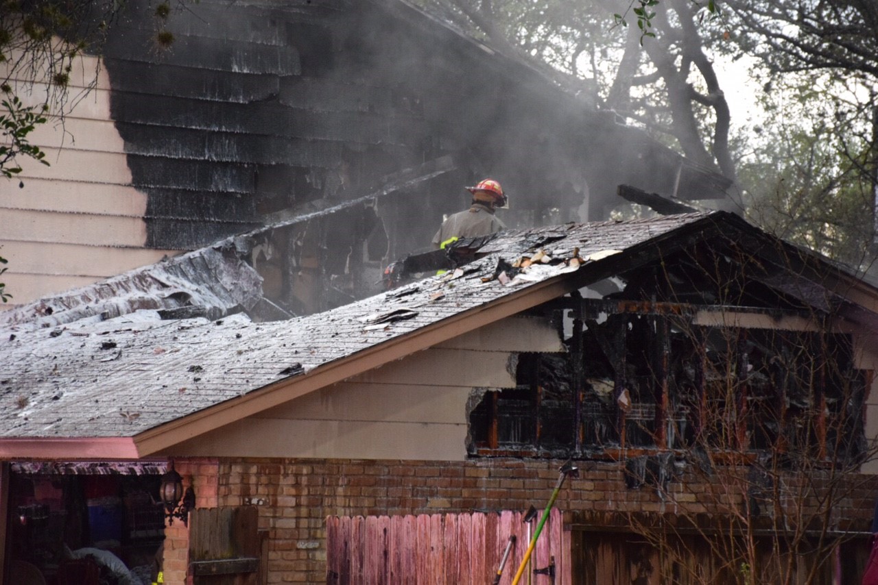Lightning strike sets North Side home on fire, neighbors warn couple inside