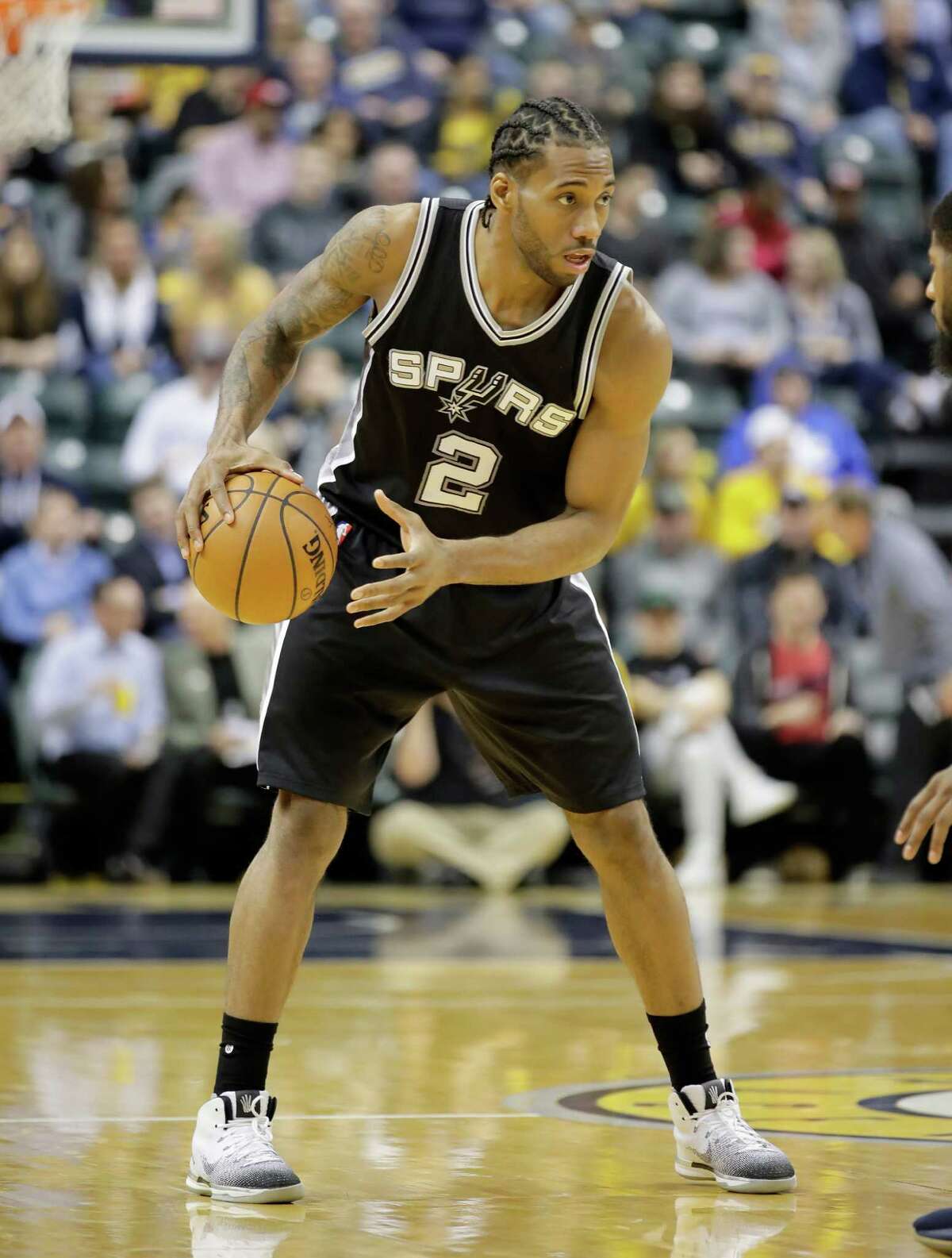 INDIANAPOLIS, IN - FEBRUARY 13: Kawhi Leonard #2 of the San Antonio Spurs dribbles the ball against the Indiana Pacers at Bankers Life Fieldhouse on February 13, 2017 in Indianapolis, Indiana. NOTE TO USER: User expressly acknowledges and agrees that, by downloading and or using this photograph, User is consenting to the terms and conditions of the Getty Images License Agreement