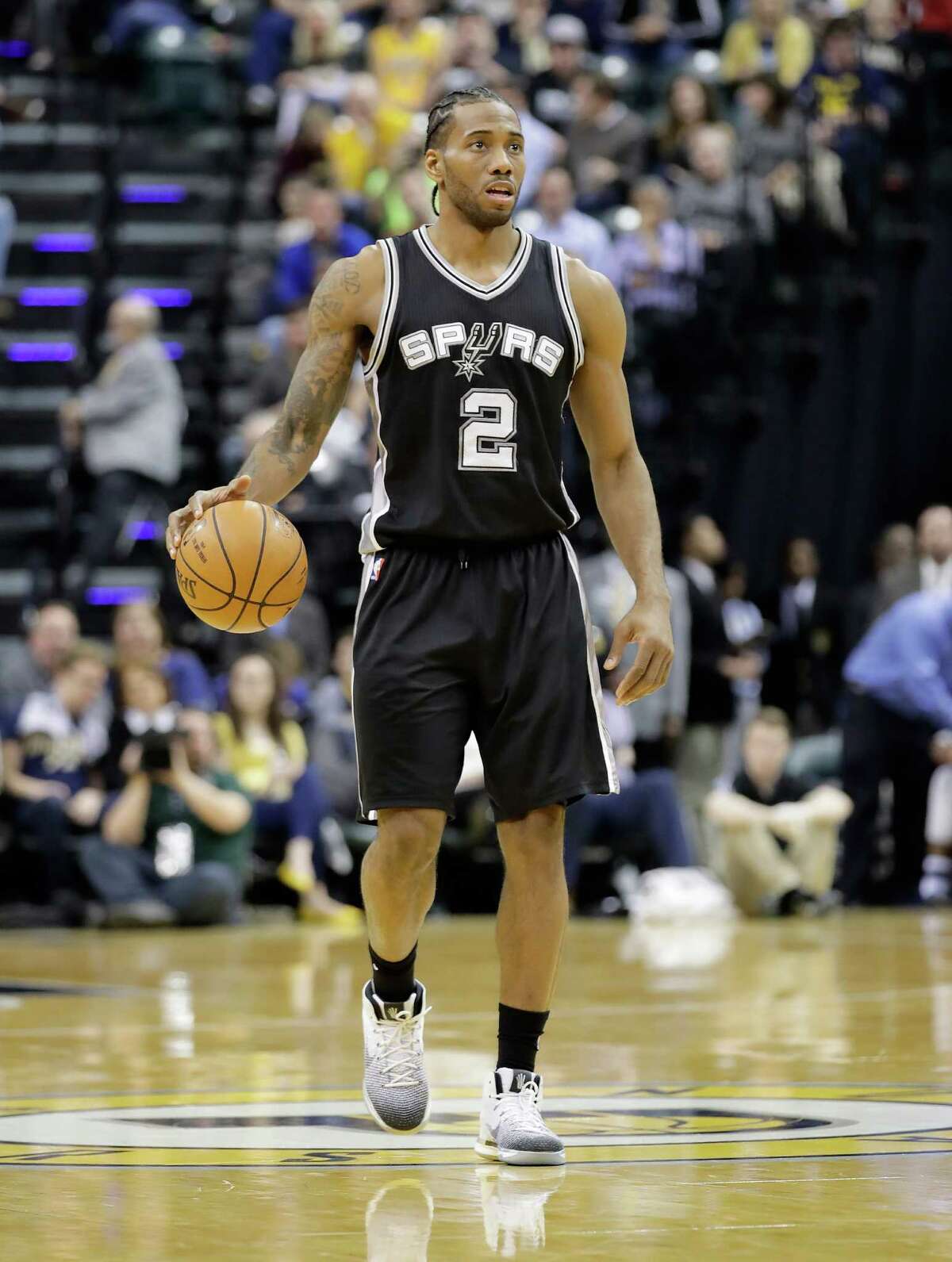 INDIANAPOLIS, IN - FEBRUARY 13: Kawhi Leonard #2 of the San Antonio Spurs dribbles the ball against the Indiana Pacers at Bankers Life Fieldhouse on February 13, 2017 in Indianapolis, Indiana. NOTE TO USER: User expressly acknowledges and agrees that, by downloading and or using this photograph, User is consenting to the terms and conditions of the Getty Images License Agreement