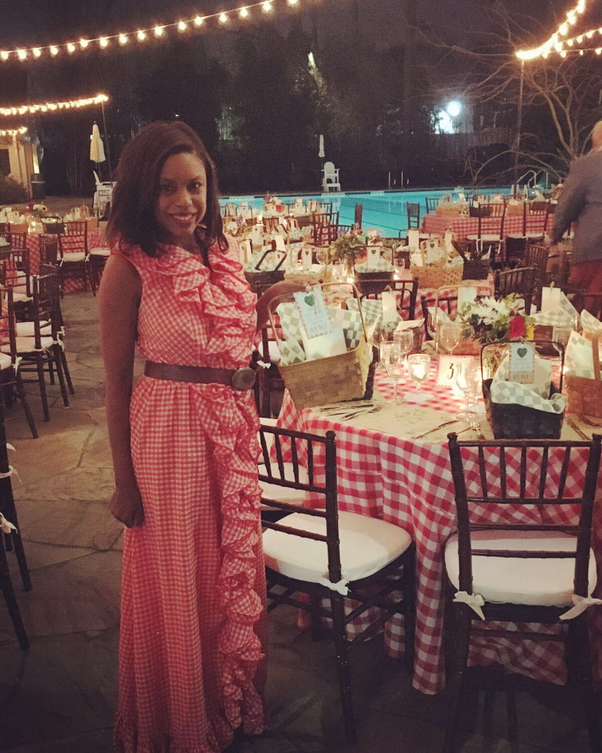 Society reporter Amber Elliott wears a gingham dress to the Memorial Park Conservancy's green gala at the Forest Club.