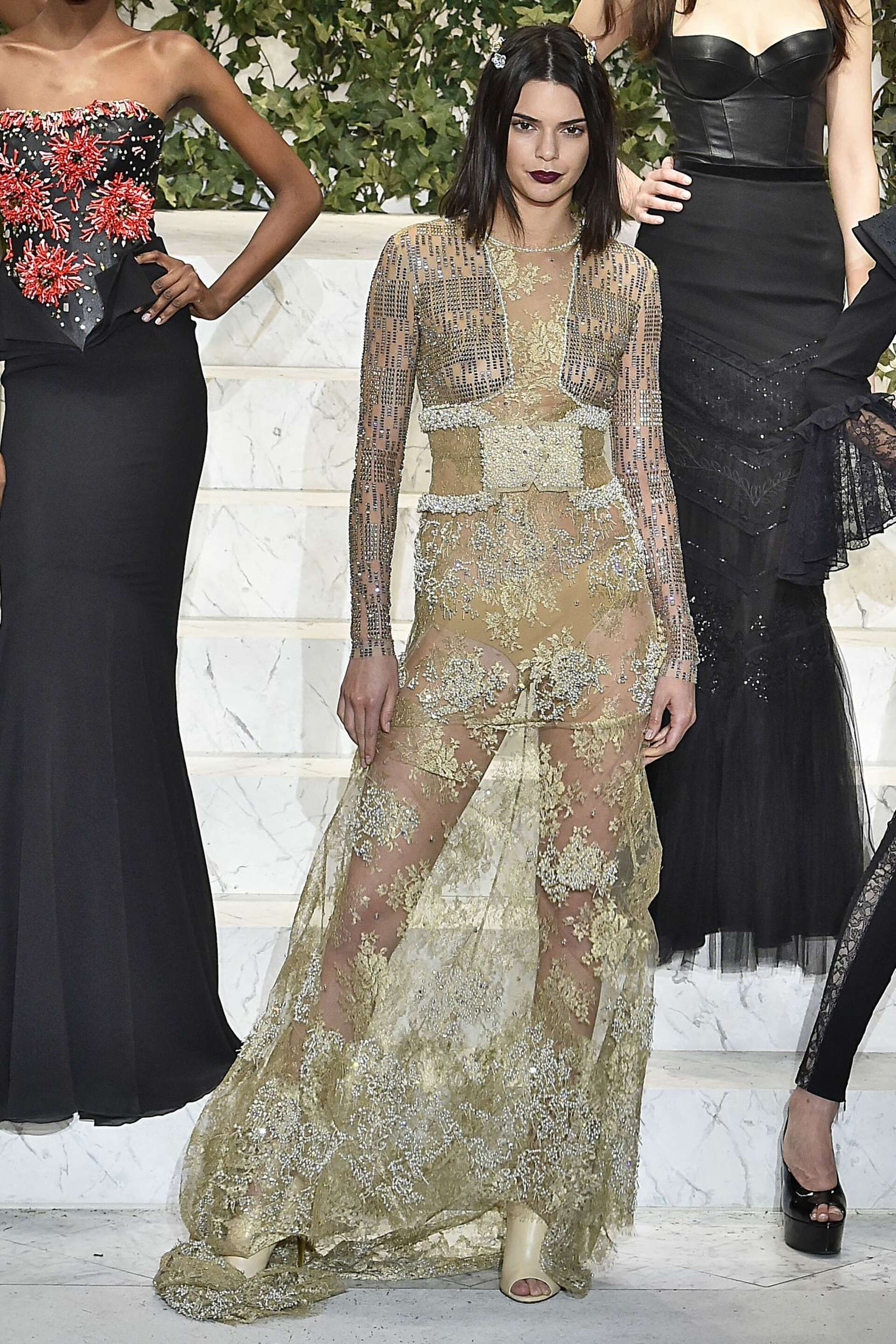 bella hadid black dress runway g. - Bella Hadid in black leather mini-dress on the Moschino X H&M catwalk