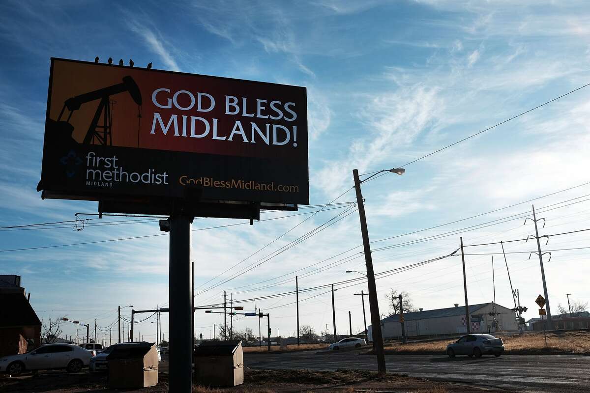 MIDLAND, TX - FEBRUARY 06: A billboard promotes the oil industry along a road in Midland on February 6, 2015 in Midland, Texas. As crude oil prices have fallen nearly 60 percent globally, American communities dependent on oil revenue prepare for hard times. Texas, which benefited from hydraulic fracturing and the shale drilling revolution, tripled its production of oil in the last five years. The Texan economy saw hundreds of billions of dollars come into the state before the global plunge in prices. Across the state drilling budgets are being slashed and companies are notifying workers of upcoming layoffs. According to federal labor statistics, around 300,000 people work in the Texas oil and gas industry, 50 percent more than four years ago. (Photo by Spencer Platt/Getty Images)