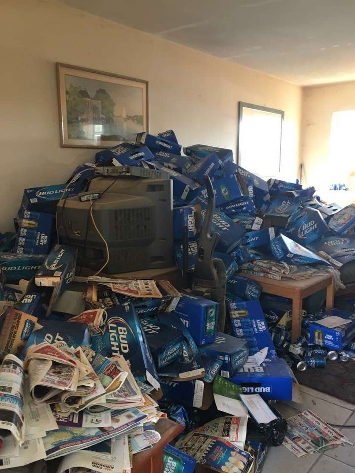 Property company finds evicted tenants left mountains of Bud Light cans,  boxes throughout home