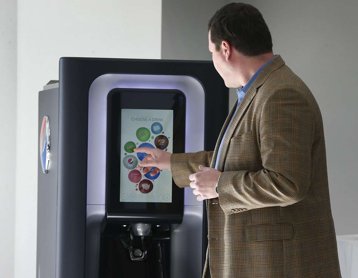 Darren Koenig, senior director of digital innovation and IoT for Pepsico, operates his company's smart soft drink dispenser at the AT&T labs in San Ramon, Calif. on Tuesday, Feb. 14, 2017. AT&T is launching its LTE-M network nationwide by the middle of 2017 to accommodate Internet of Things devices operating wirelessly.