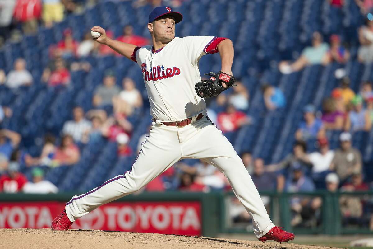 Philadelphia Phillies relief pitcher David Hernandez throws a pitch during the ninth inning of a baseball game against the Atlanta Braves, Sunday, Sept. 4, 2016, in Philadelphia. The Braves won 2-0. (AP Photo/Chris Szagola)