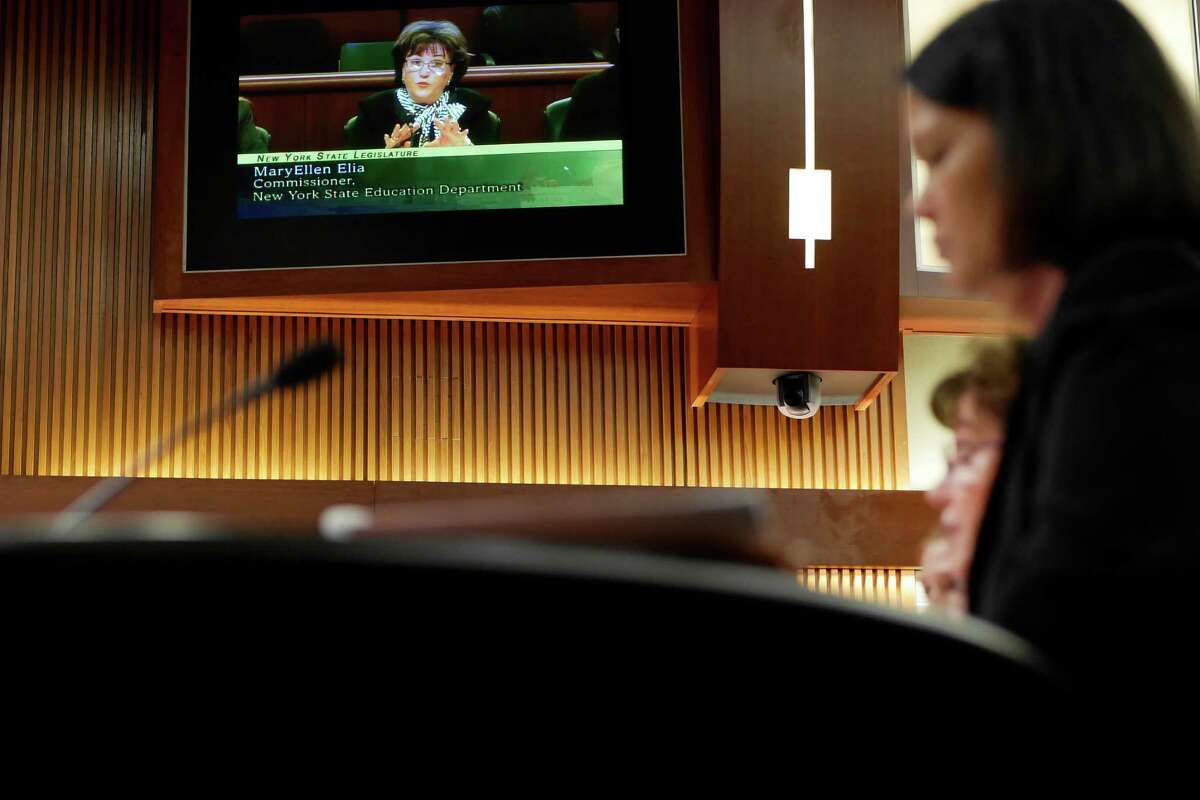 New York State Education Department Commissioner MaryEllen Elia is seen on a monitor in the hearing room showing the live feed as she testifies before a joint Legislative Budget Hearing on Elementary and Secondary Education on Tuesday, Feb. 14, 2017 in Albany, N.Y. (Paul Buckowski / Times Union)