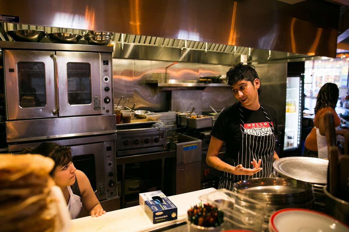 Marisol Heredia, left, and Preeti Mistry, head chef and owner, prep food together at Juhu Beach Club in Oakland, Calif. Tuesday, February 14, 2017.