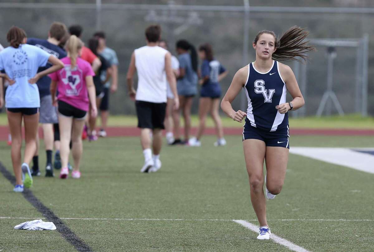 Smithson Valley pole vaulter Colleen Clancy warms up the school on Feb. 13, 2017.