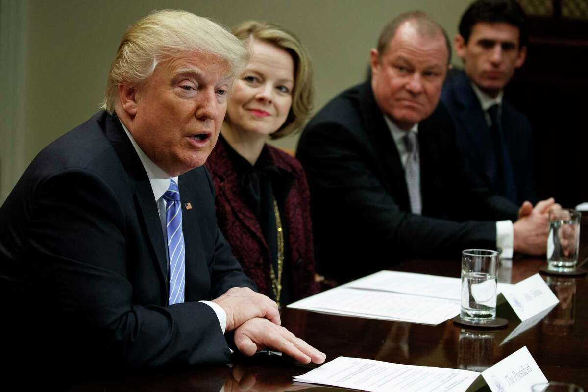 President Donald Trump speaks during a meeting with retail industry leaders in the Roosevelt Room of the White House in Washington, Wednesday, Feb. 15, 2017. From left are, Trump, Jo-Ann Craft Stores CEO Jill Soltau, Gap Inc. CEO Art Peck, and Jeremy Katz, an adviser to National Economic Council Director Gary Cohn. (AP Photo/Evan Vucci)