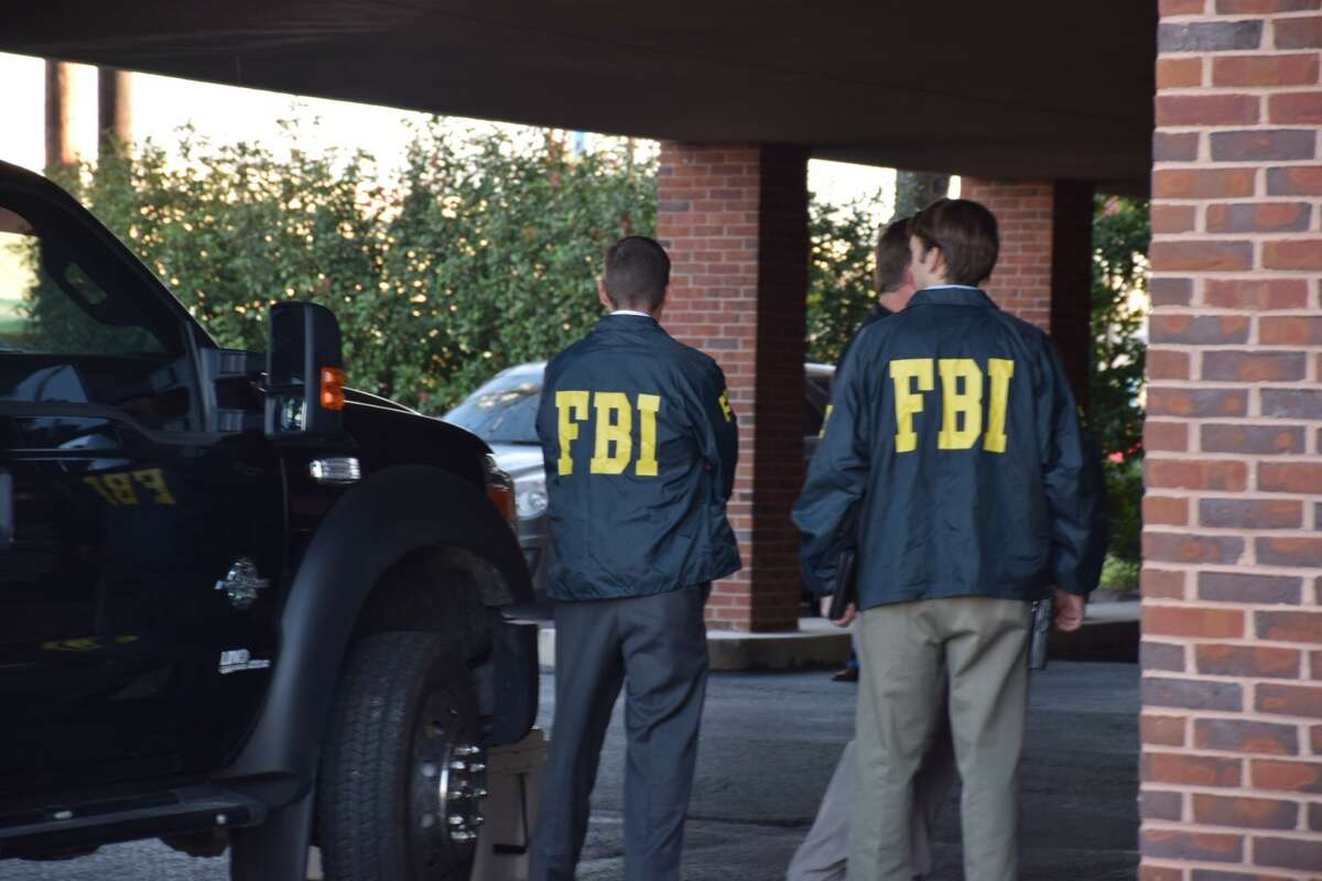 The FBI raids the law office of state Sen. Carlos Uresti in San Antonio on Thursday, Feb. 16, 2017.