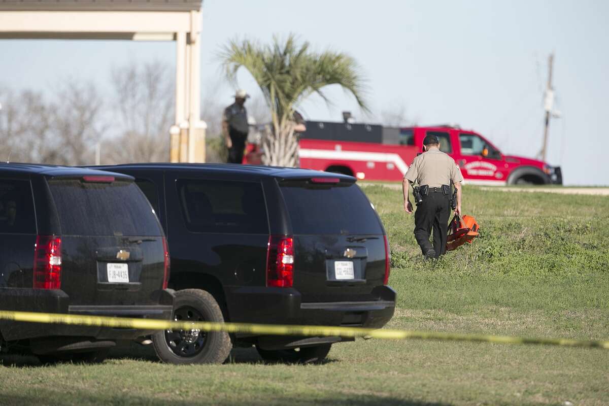 Travis County Sheriff's Department personnel work at Austin 1st Church as they investigate the scene of an officer involved shooting on Burch Drive off Highway 71 in Del Valle on Wednesday, February 15, 2017. The Sheriff's department says a man kidnapped a woman at gunpoint from a local business before a shooting occurred after they encountered a Travis County deputy. The woman is dead and the man is critically injured, police said. DEBORAH CANNON / AMERICAN-STATESMAN