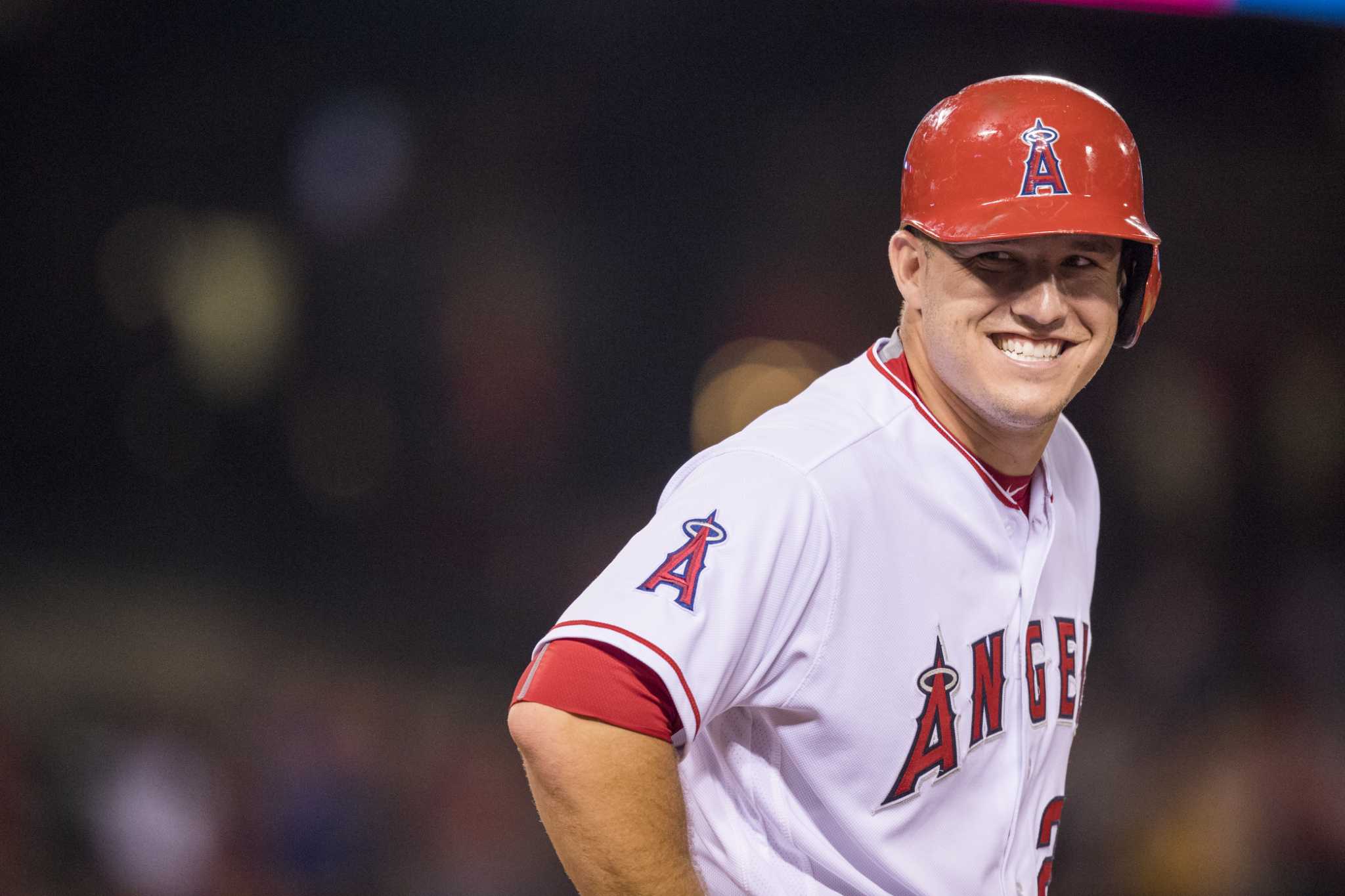 Josh Hamilton of the Los Angeles Angels of Anaheim smiles as wife News  Photo - Getty Images