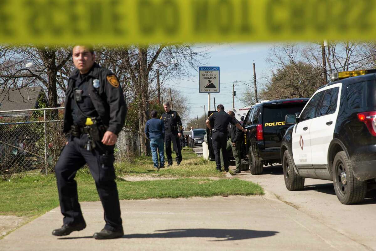 San Antonio Police Chief William McManus talks with a neighbor after an officer shot and killed a person at a home on Vickers Avenue near Kyle Street in San Antonio, Texas on February 16, 2017. Ray Whitehouse / for the San Antonio Express-News