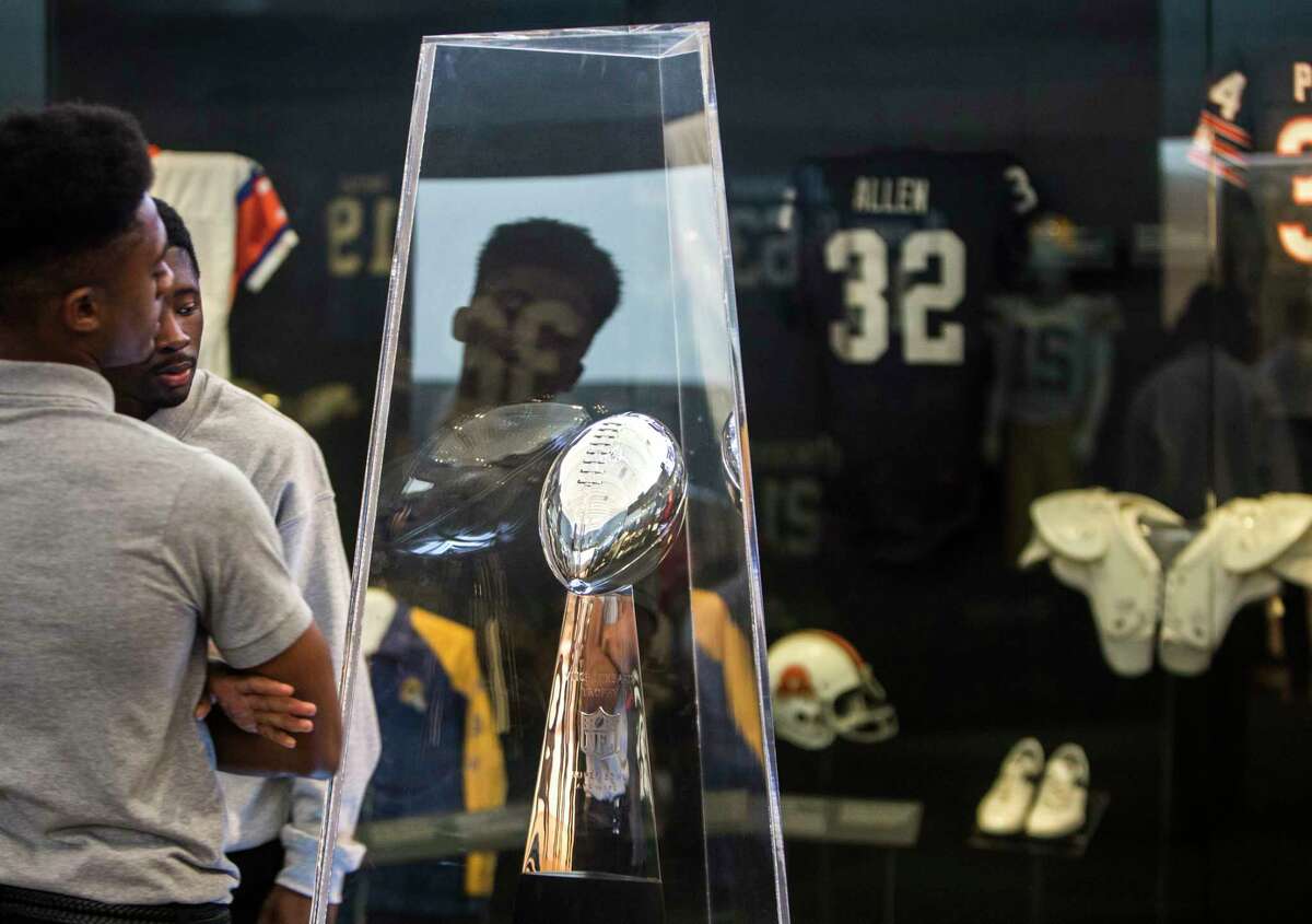Students from Pro-Vision Academy take a tour of the Pro Football Hall of Fame's Gridiron Glory, traveling exhibit on the campus of Texas Southern University on Thursday, Feb. 16, 2017, in Houston.
