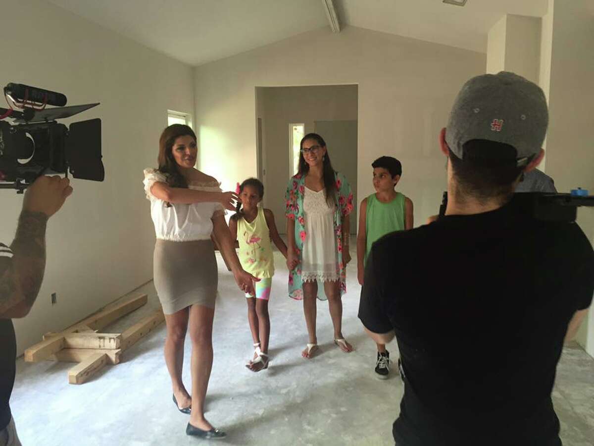 While cameras rolled, Claudia Garofalo, host of a new San Antonio reality show that shows how people can fit big dreams in small houses, takes a family through the process. 