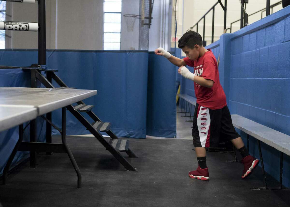 Ricky Sauseda, 11, warms up at Lincoln Community Center, Tuesday, Feb. 14, 2017, in San Antonio.