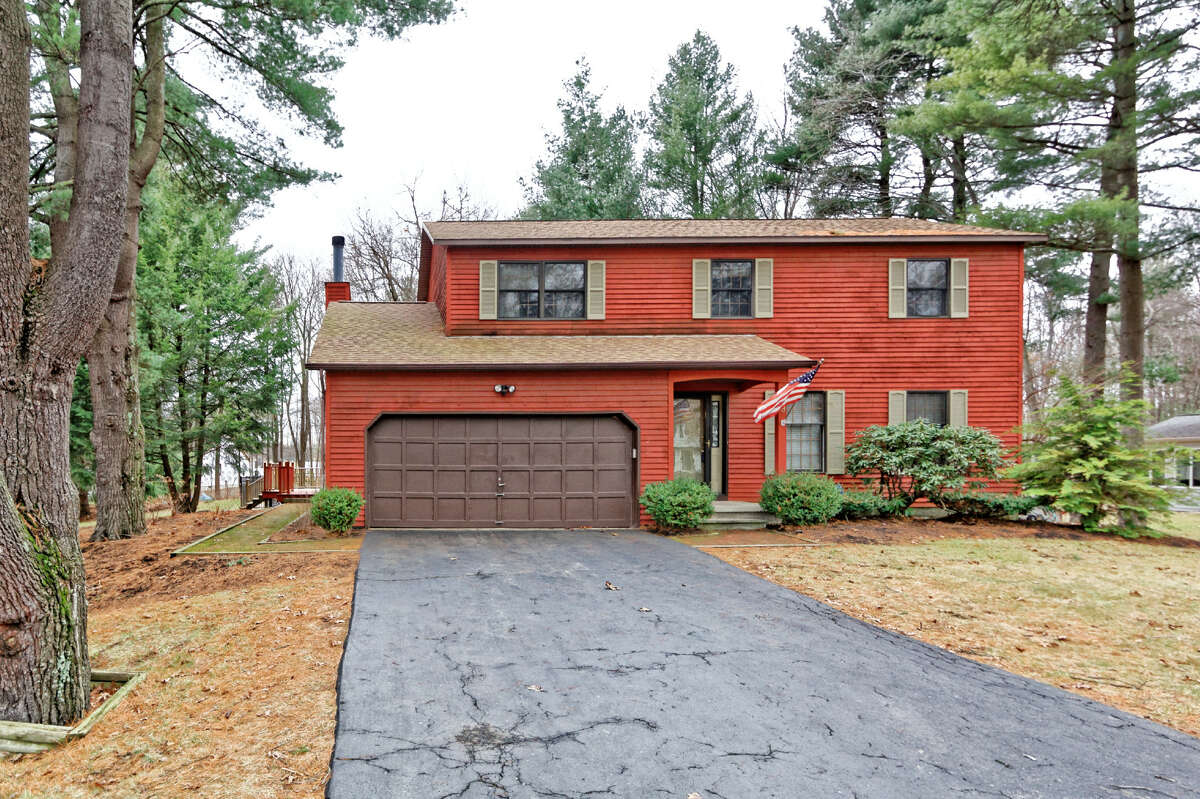 9 Maryanne Drive Clifton Park The bright-colored cedar siding makes this 1,935 square-foot house grab your attention. Inside, it features a wraparound porch, large eat-in kitchen, four bedrooms and 2 1 2 bathrooms, plus a full basement. (Anthony Gucciardo)