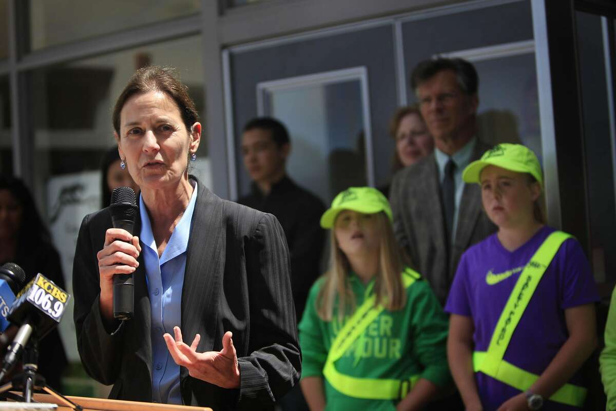 Peggy Knudson (left), UCSF Professor of Surgery based at San Francisco General Hospital and Trauma Center, speaks during a press conference at Lakeshore Elementary School.