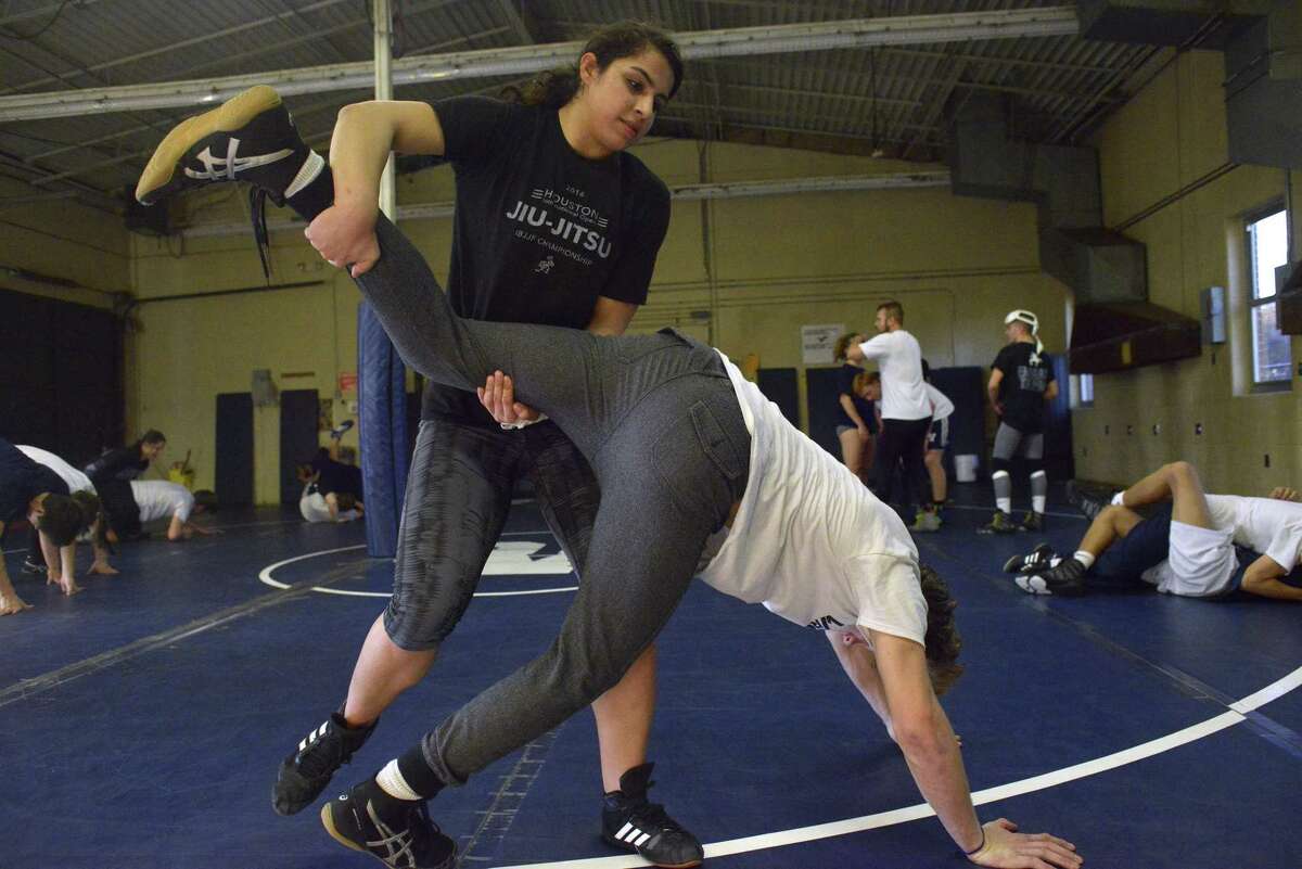 Smithson Valley’s Ariana Mendoza works out during wrestling team practice on Feb. 15, 2017. Mendoza is the District 14-6A champion in the 185-pound weight class.