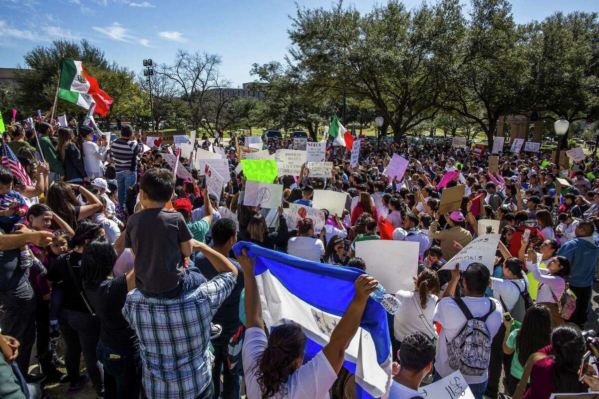 Protesters march in the streets outside the Texas State Capital on Day Without Immigrants in Austin. The crowd, which grew to well over a thousand participants, marched from the Austin City Hall to the Texas State Capital.