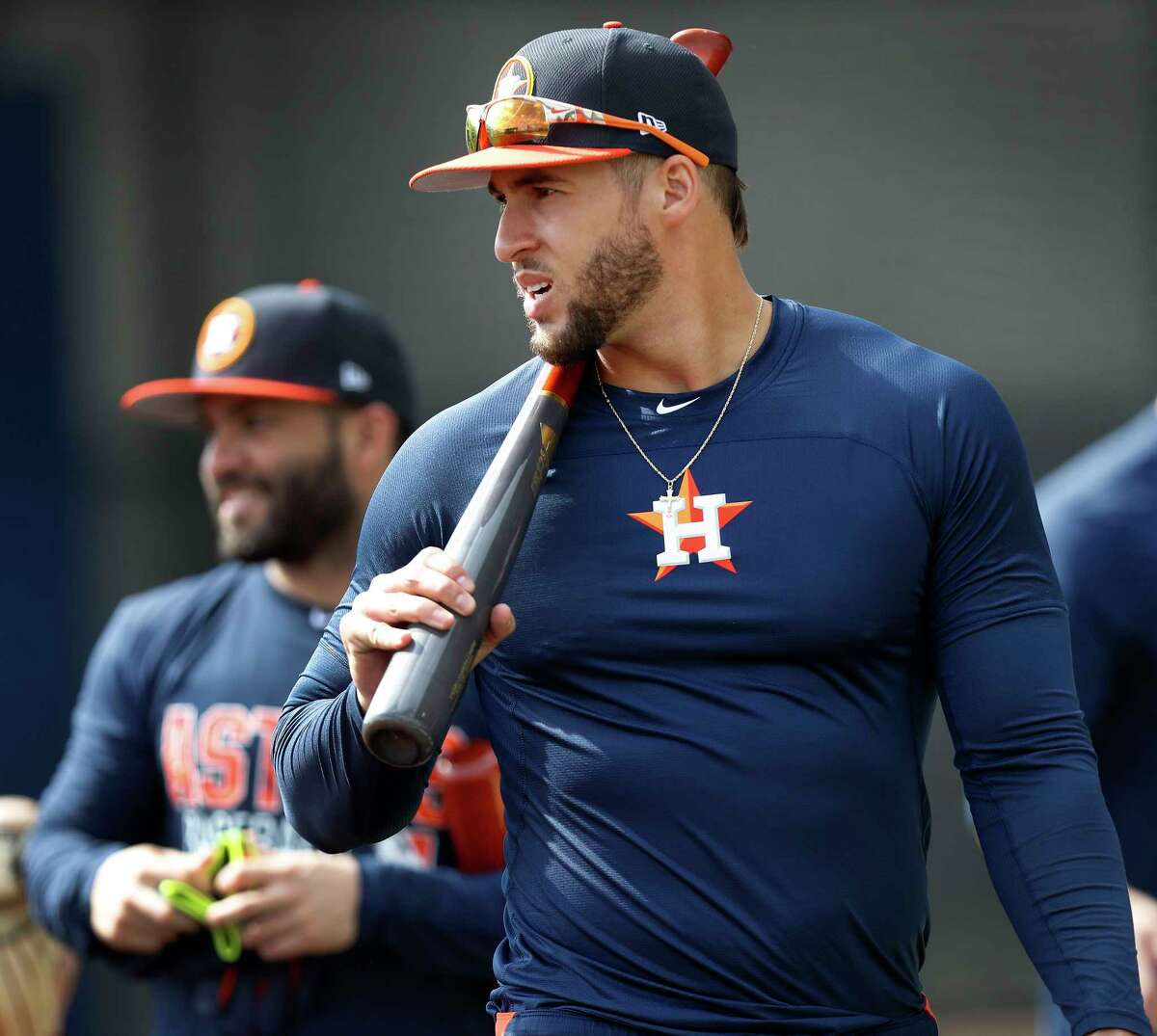 George Springer, who hopes to pick up tips from veteran outfielder Carlos Beltran this season, carries his bat to work to join the rest of the early-to-camp position players Thursday in West Palm Beach, Fla.