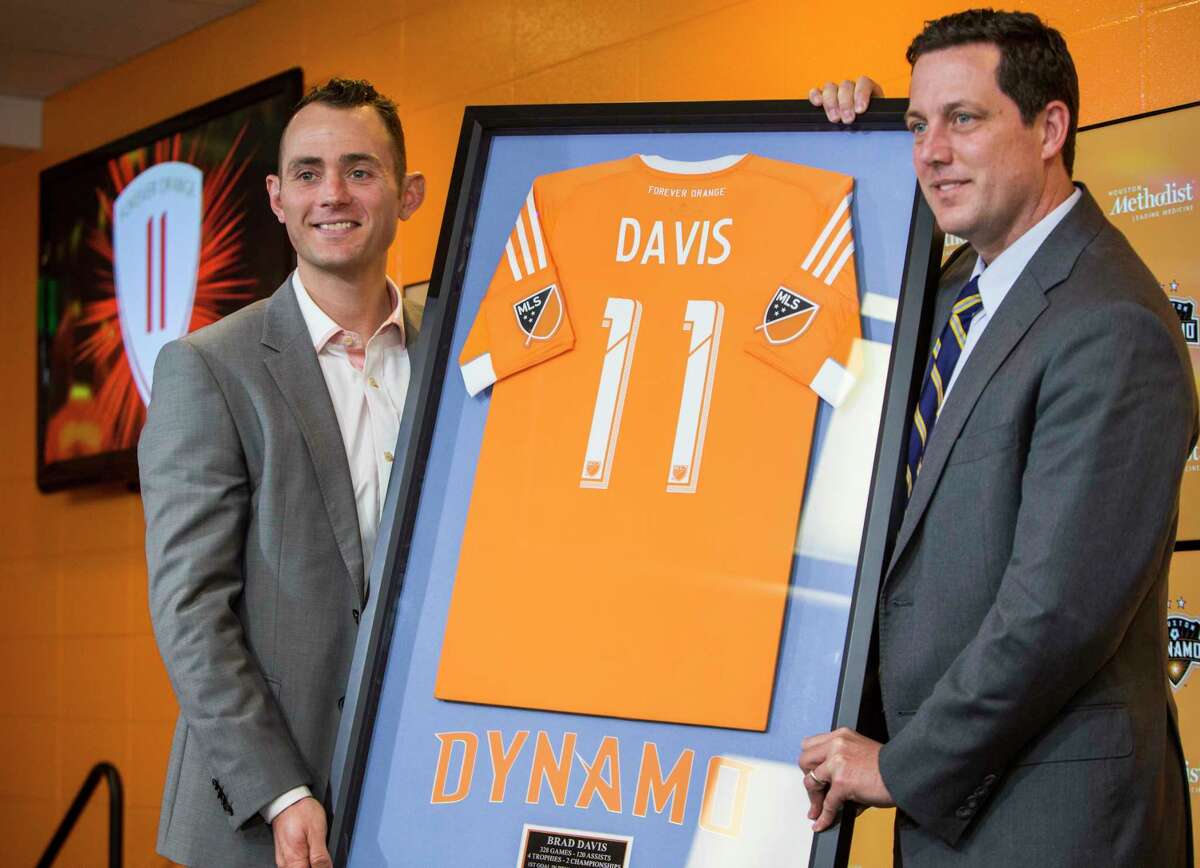 Longtime Dynamo midfielder Brad Davis, left, signed a one-day contract to retire with the team he spent a decade ﻿with Thursday﻿. Davis, who was the club's leader in five categories, helped lead the Dynamo to two MLS Cup titles and two other Cup finals.