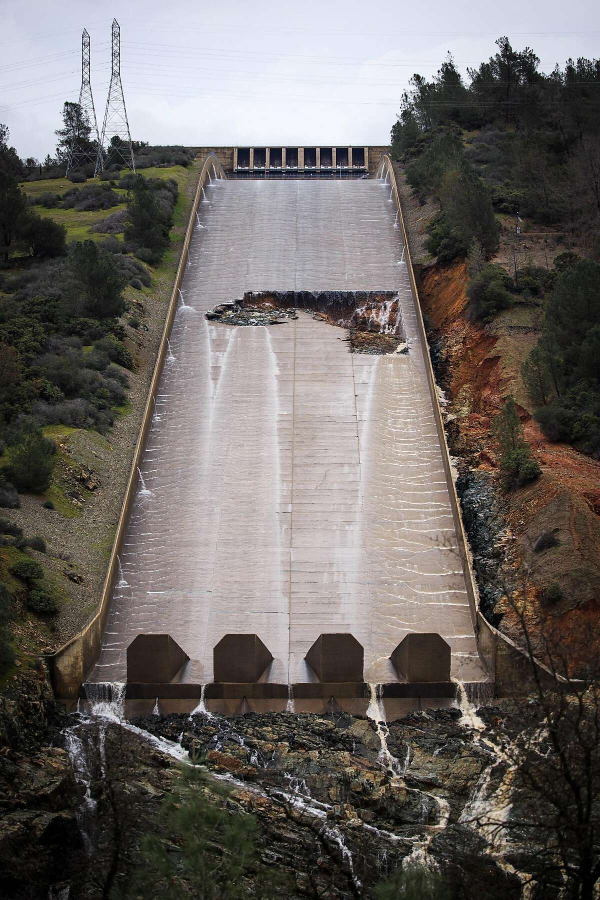A hole was torn in the spillway of the Oroville Dam while releasing approximately 60,000 cubic-feet-second of water in advance of more rain on February 7, 2017 in Oroville, California.