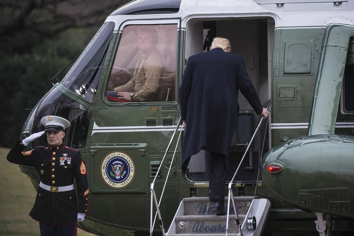 President Donald Trump boards Marine One on the South Lawn of the White House on Feb. 3, headed for his Mar-a-Lago Club in Palm Beach, Fla.