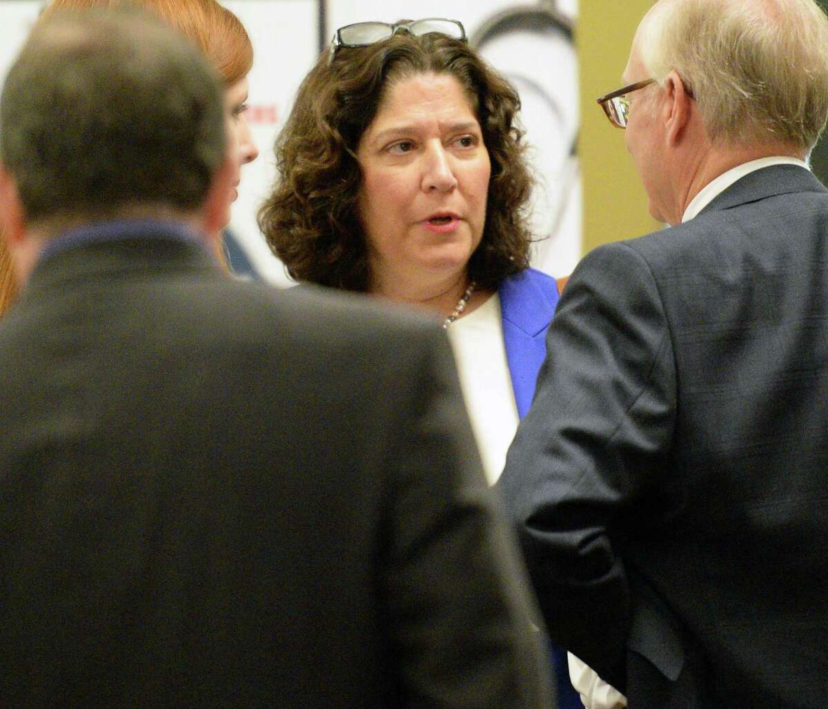 Superintendent of the New York State Department of Financial Services Maria Vullo, center, speaks with attendees during NY Health Plan Association's annual conference Thursday Nov. 17, 2016 in Troy, NY. (John Carl D'Annibale / Times Union)
