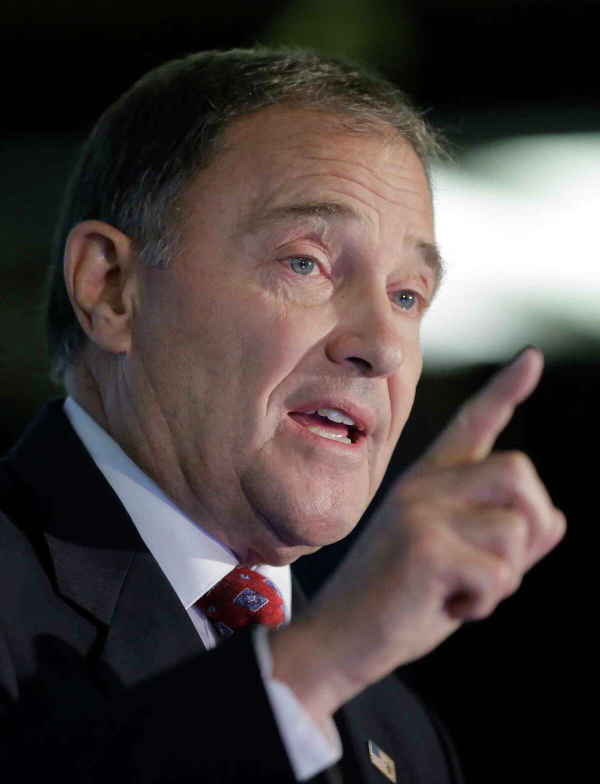 FILE - In this Sept. 16, 2016 file photo, Utah Gov. Gary Herbert speaks at a debate in Salt Lake City. Organizers of a lucrative outdoor trade show that's been held twice yearly in Utah for two decades say they will continue looking for a new home after hearing "more of the same" on public lands from Herbert during a conference call Thursday, Feb. 16, 2017. (AP Photo/Rick Bowmer, File)