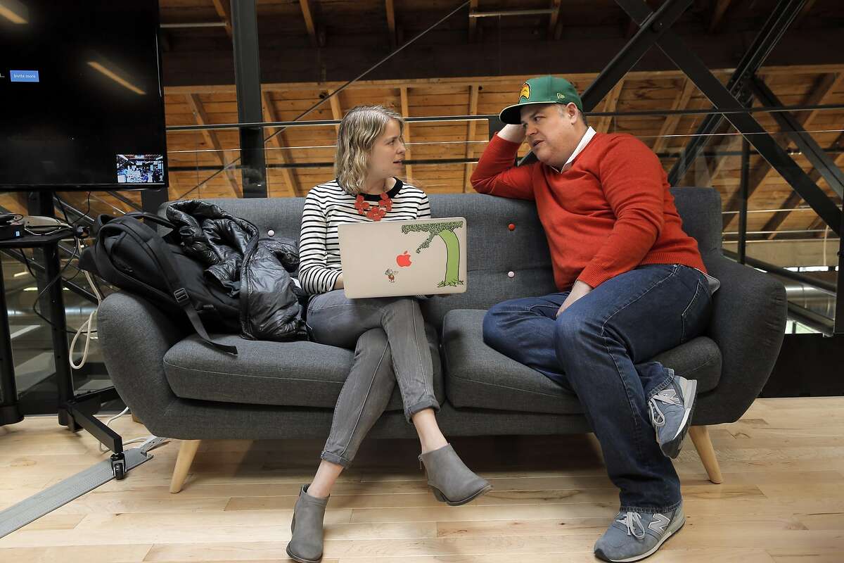 Lowell Goss, head of design at Five Star, right, goes over some work with Samantha Berg, left, at the company's headquarters in San Francisco, Calif., on Thursday, February 16, 2017. Goss, a former top executive at Amazon, is warning of a dsytopian future of impersonal automation. By killing small businesses, Goss argues Amazon, which is starting Amazon Go, a new, automated checkout-free grocery store, is having a "corrosive impact on our local communities."