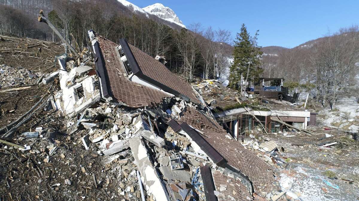 This frame taken from an aerial video shows the rubble of the Hotel Rigopiano which was buried by an avalanche in January, near Farindola, central Italy, Thursday, Feb. 16, 2017. The avalanche buried a hotel in central Italy under 60,000 tons of snow leaving 29 dead. (La Repubblica via AP)