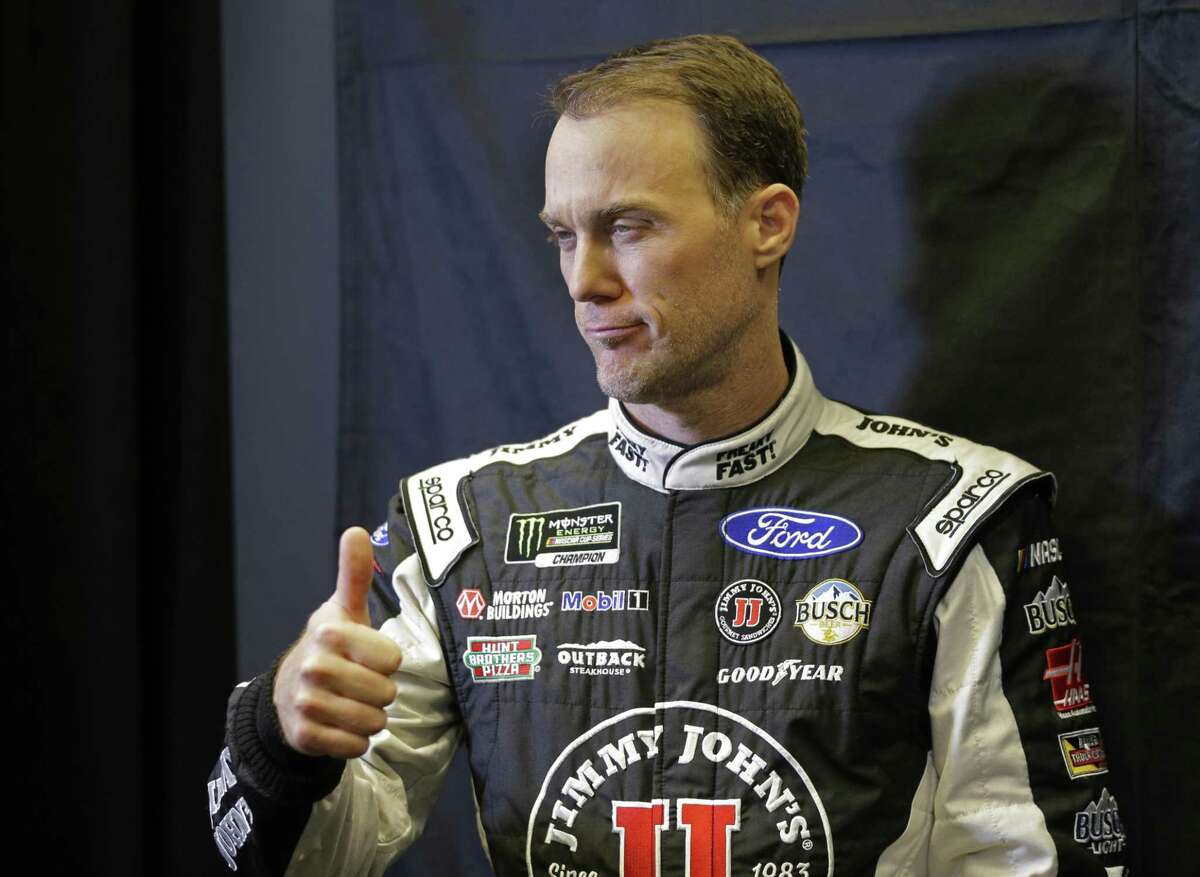 Kevin Harvick gives a thumbs up during the NASCAR Media Tour in Charlotte, N.C., on Jan. 24, 2017.