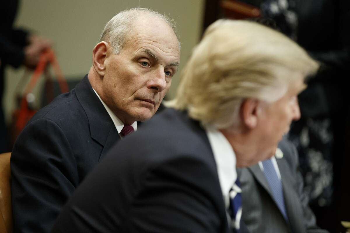 FILE - This is a Tuesday, Jan. 31, 2017 file photo of Homeland Security Secretary John Kelly as he listens at right as President Donald Trump speaks during a meeting on cyber security in the Roosevelt Room of the White House in Washington. Top world leaders, diplomats and defense officials are getting their first opportunity to meet in person with members of President Donald Trump’s new administration, amid a laundry list of concerns including the American commitment to the NATO alliance and Washington’s posture toward Russia. Vice President Mike Pence, Defense Secretary Jim Mattis and Homeland Security Secretary John Kelly are leading the U.S. delegation to the annual Munich Security Conference. (AP Photo/Evan Vucci, File)