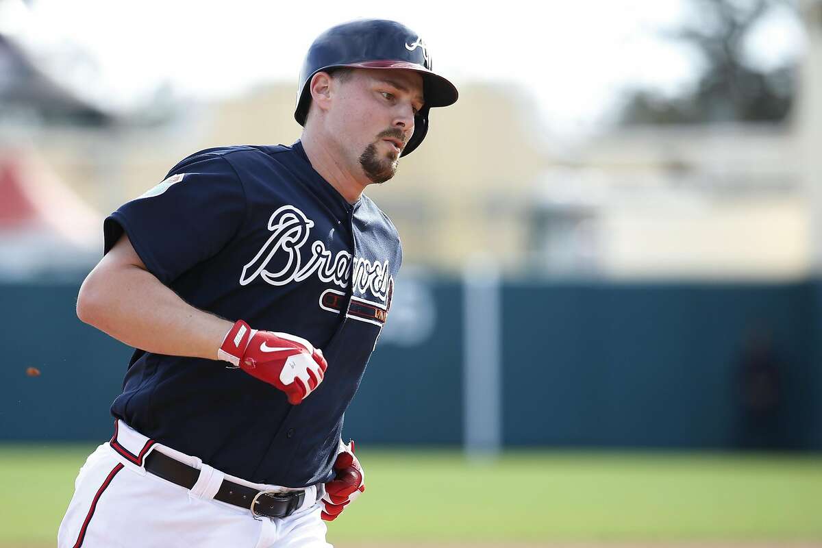 LAKE BUENA VISTA, FL - MARCH 5: Ryan Lavarnway #19 of the Atlanta Braves rounds the bases after hitting a home run in the eighth inning of a spring training game against the Pittsburgh Pirates at Champion Stadium on March 5, 2016 in Lake Buena Vista, Florida. The Pirates defeated the Braves 9-6. (Photo by Joe Robbins/Getty Images)
