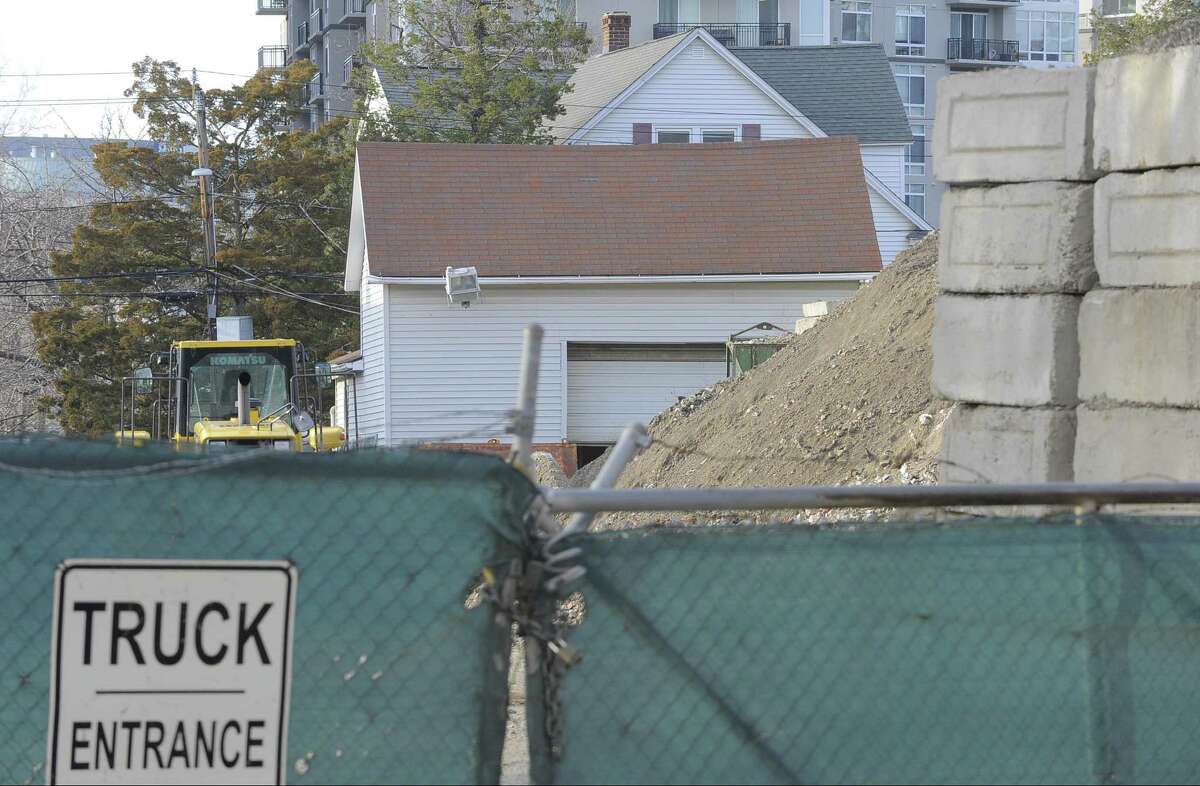 Vitti Construction of Stamford, is fighting over its materials processing operation where neighbors are complaining about a giant pile of rock shown in this photograph taken on March 30, 2016, looming over garages.